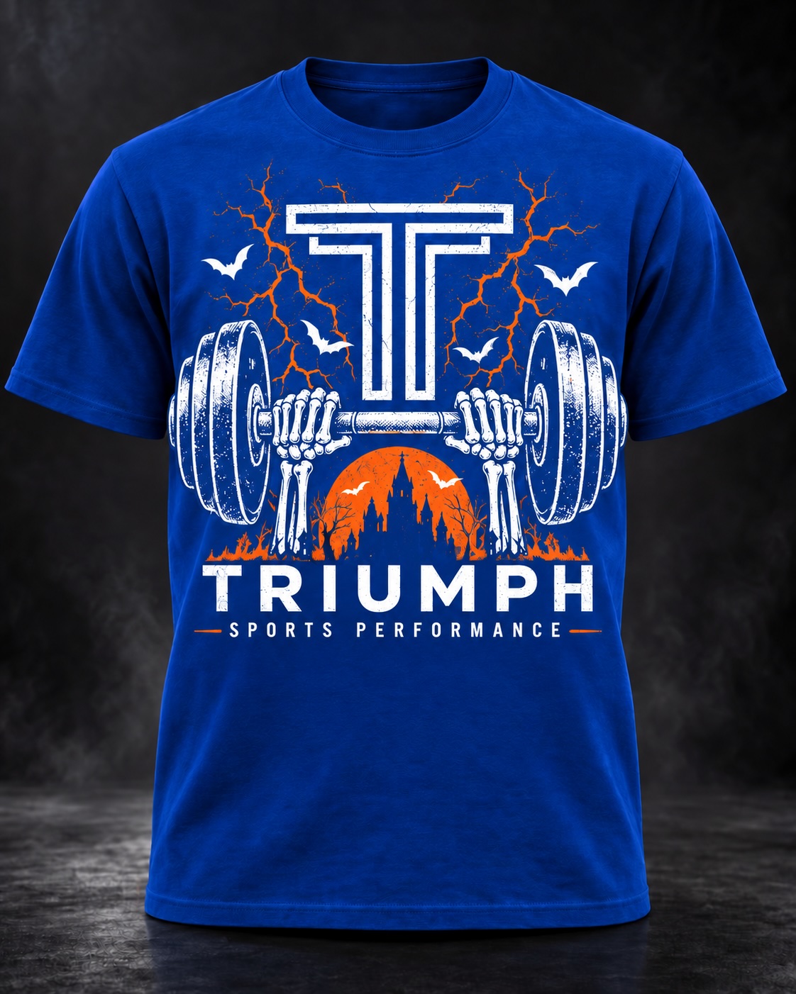 Royal blue Triumph shirt with skeleton hands gripping a barbell and orange Halloween accents